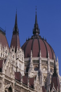 HUNGARY, Budapest, Part view of domed roof and exterior facade of Parliament building. Eastern