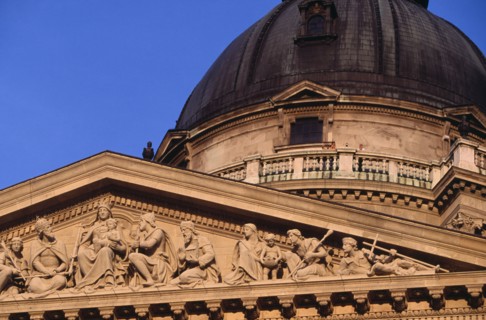 HUNGARY, Budapest, Basilica of St Stephen.  Part view of carved portico and dome of roof. Eastern