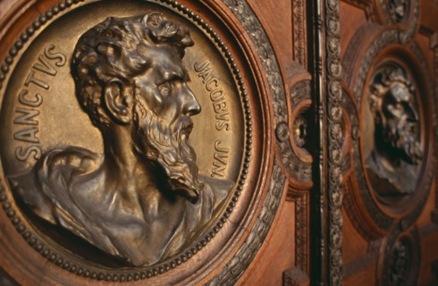 HUNGARY, Budapest, Basilica of St Stephen.  Detail of door with bronze relief carvings of the heads