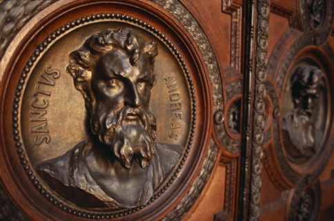 HUNGARY, Budapest, Basilica of St Stephen.  Detail of door with bronze relief carvings of the heads