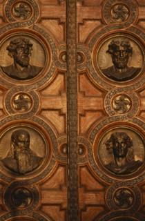 HUNGARY, Budapest, Basilica of St Stephen.  Detail of door with bronze relief carvings of the heads