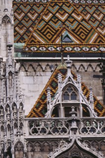 HUNGARY, Budapest, Castle Hill.  Matyas Church  detail of exterior and coloured roof tiles. Eastern