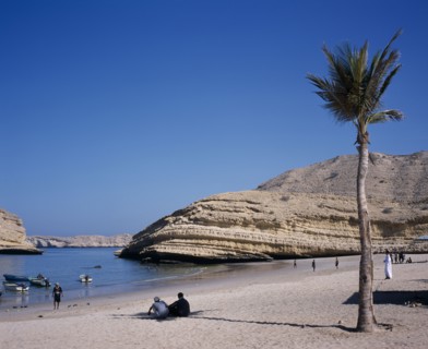 OMAN, Muscat, "Bandar Jissah beach near Al-Bustan Hotel just outside the capital city.  People at