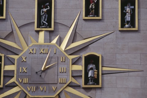 BELGIUM, Brabant, Brussels, Detail of building facade and Jacquemart clock.  Figures representing