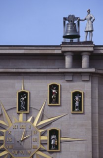 BELGIUM, Brabant, Brussels, Detail of building facade and Jacquemart clock.  Figures representing