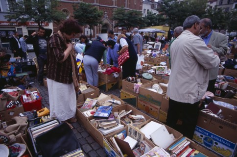 BELGIUM, Brabant, Brussels, "Flea Market. Place du Jeu de Balle, the Marolles. People rummaging
