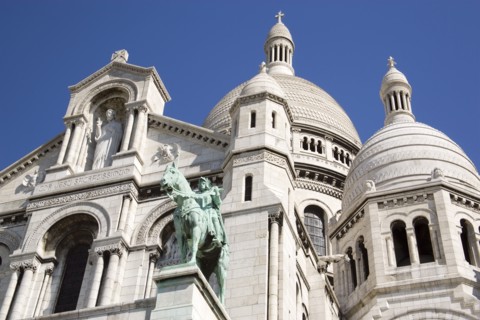 FRANCE, Ile de France, Paris, Montmartre The Church of Sacre Coeur or Sacred Heart with the bronze