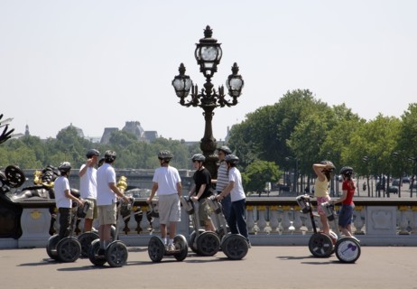 FRANCE, Ile de France, Paris, "Children on the Pont Alexandre III across the River Seine. Touring