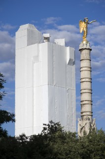FRANCE, Ile de France, Paris, Les Halles. A gilded statue on top of a column in Place du Chatelet