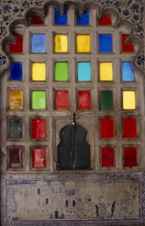 INDIA, Rajasthan, Udaipur, Stained glass window and decorated surround.