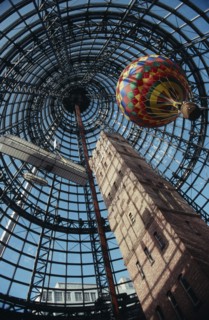 AUSTRALIA, Victoria, Melbourne, "Looking up at the old Shot Tower, hot air balloon and bi-plane