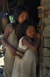 COLOMBIA, Sierra Nevada de Santa Marta, "Young Kogi-Wiwa girls in traditional dress, youngest