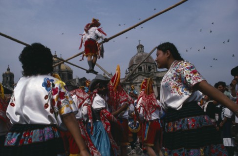 MEXICO, Mexico City, "Our Lady of Guadelope Festival dancers, musicians and acrobats in front of