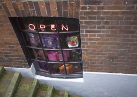 ENGLAND, East Sussex, Brighton, Basement sex shop selling marital aids in a tiny alleyway in the