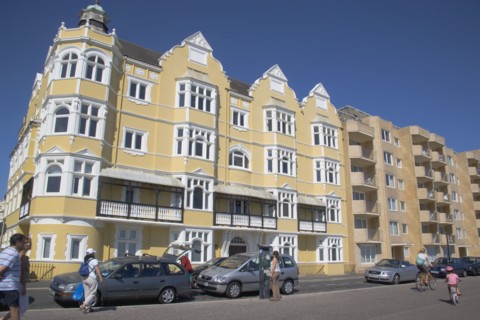 ENGLAND, East Sussex, Brighton, Modern and traditional apartment blocks on the seafront at Hove.