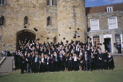 EDUCATION, University, Graduation, "Graduate wearing their mortar boards and gowns, posing for a