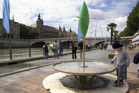 FRANCE, Ile de France, Paris, "The Paris Plage urban beach. A small boy at one of the many free