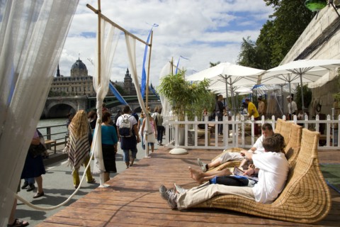 FRANCE, Ile de France, Paris, "The Paris Plage urban beach. People strolling between the River