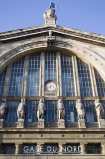 FRANCE, Ile de France, Paris, The front of the Gare du Nord railway station with statues and clock