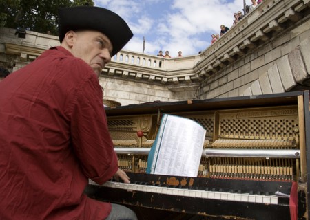 FRANCE, Ile de France, Paris, The Paris Plage urban beach. A singer playing a piano to an audience