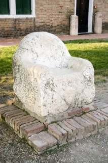 ITALY, Veneto, Venice, A marble seat said to be used as a throne by the 5th Century king Attila on