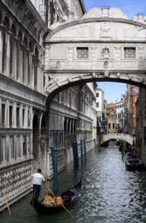 ITALY, Veneto, Venice, Gondola with tourists passes along the Rio Del Palazzo under the Bridge of