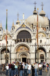 ITALY, Veneto, Venice, Tourists in Piazza San Marco in front of St Marks Basilica