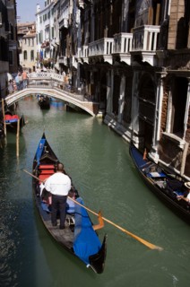 ITALY, Veneto, Venice, Gondolas with tourists passing along the Rio del Palazzo canal with its many