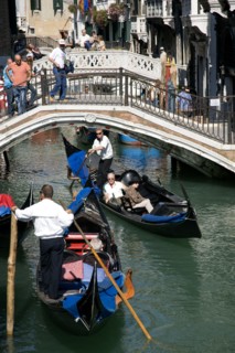 ITALY, Veneto, Venice, Gondolas with tourists passing along the Rio del Palazzo canal with its many