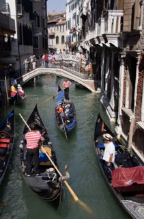 ITALY, Veneto, Venice, Gondolas with tourists passing along the Rio del Palazzo canal with its many