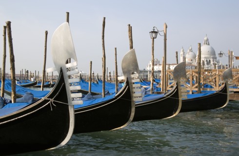 ITALY, Veneto, Venice, Ferros or bows of Gondolas moored in the Molo San Marco basin with the