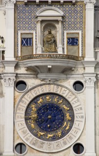 ITALY, Veneto, Venice, The Madonna on the Torre dell'Orologio clock tower above the ornate clock