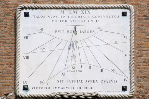 ITALY, Veneto, Venice, A sundial on the wall of the Arsenal with year in Roman numerals and words