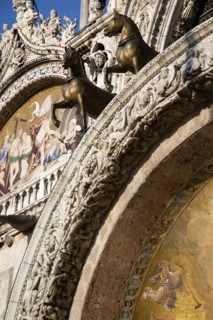 ITALY, Veneto, Venice, Two of the four bronze Horses of St Mark above the central doorway on the
