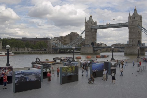 ENGLAND, London, The Queens walk open air exhibition outside the GLA city hall with Tower Bridge