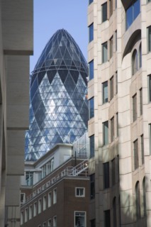 ENGLAND, London, "Detail of the top of the Gherkin Swiss RE Building, 30 St Mary Axe, seen through