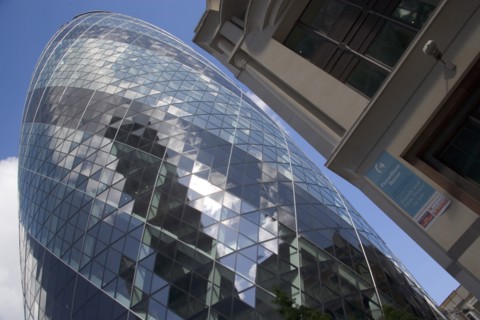 ENGLAND, London, The Swiss Re building 30 St Mary Axe alternatively known as the Gherkin. Designed