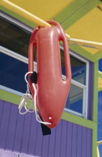 USA, Florida, Miami Beach, Rescue float hanging from colourful lifeguard station
