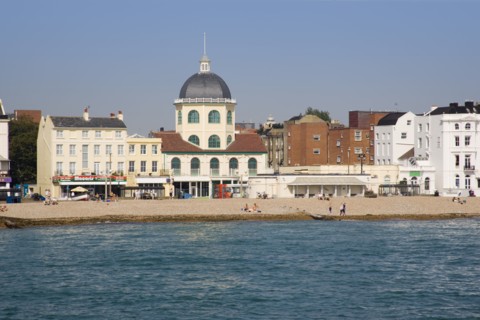 ENGLAND, West Sussex, Worthing, View from the pier across the sea towards The Dome Cinema and