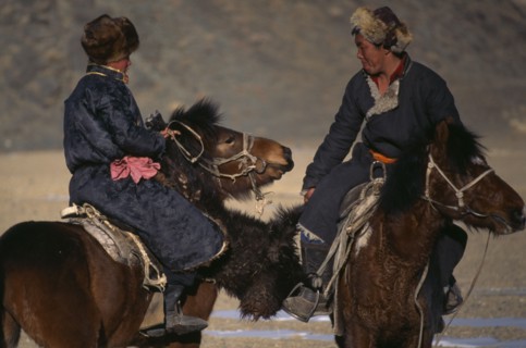 MONGOLIA, Bayan Olgi Province, Nomads, Kazakh nomads playing Bozkashi at Kazakh New Year festival.