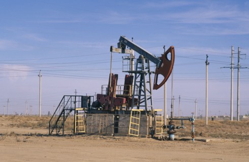 KAZAKHSTAN, Krzloroa, Oil derrick in a rural setting..