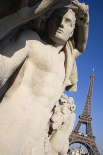 FRANCE, Ile de France, Paris, Stone sculptures in the Jardin du Trocadero with the Eiffel Tower