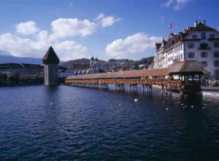 SWITZERLAND, Lucerne Central, Lucerne, Kappelbrucke flower decked covered bridge spanning across