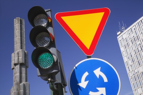 SWEDEN, Stockholm, Traffic signal and signs in Sergels Torg.
