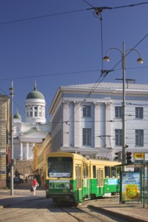 FINLAND, Helsinki, City centre tram with the Tuomiokirkko (Lutheran Cathedral) in the background.