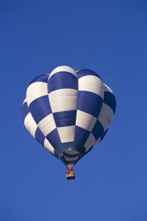 ENGLAND, Bristol, Blue and white checked hot air balloon.
