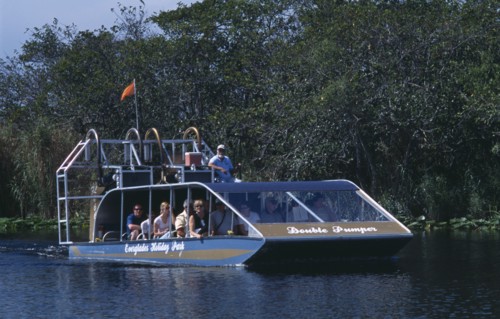 USA, Florida, Fort Lauderdale, Tourists Air boating in the Everglades National Park
