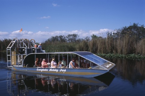 USA, Florida, Fort Lauderdale, Tourists Air boating in the Everglades National Park