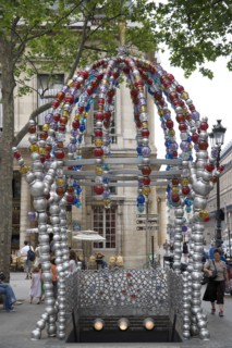 FRANCE, Ile de France, Paris, Colourful modern metal and glasswork entrance to the Metro in Place