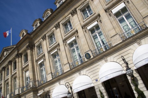 FRANCE, Ile de France, Paris, The Ritz Hotel in Place Vendome with the French Tricolour flying from